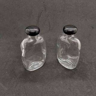 Lọ thủy tinh 100ml (combo 2 cái) bầu dục kiểu dẹt nắp nhựa đen tròn - Chai thủy tinh nhỏ - Chai thủy tinh mini
