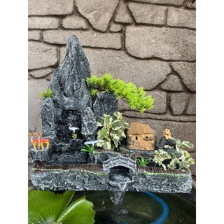Hòn non bộ hồ cá - thác nước tạo oxy cho cá