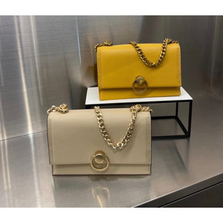 Túi CNK (Charles & Keith) màu vàng new auth giá sale