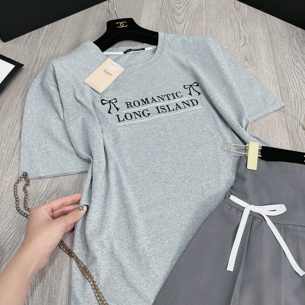 Set Bộ Đồ Nữ Áo Phông Xám Thêu ROMANTIC Ngắn Tay Mix Chân Váy Xếp Ly 2 Nơ Trắng Freesize S388