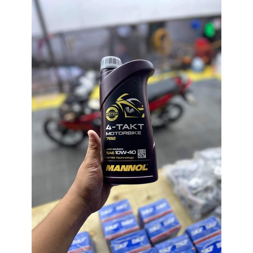 Nhớt Mannol 10W40 7812 MOTORBIKE 4- TAKT Tặng kèm Súc Động Cơ