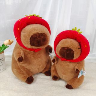 Gấu bông Capybara đội mũ dâu. thú nhồi bông capybara dâu