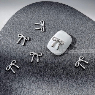 Set 50 charms nơ kim loại bạc trang trí móng