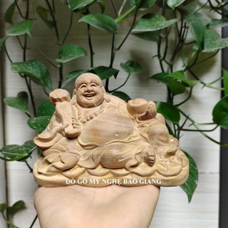 Tượng phật di lặc để ô tô gỗ xá xị