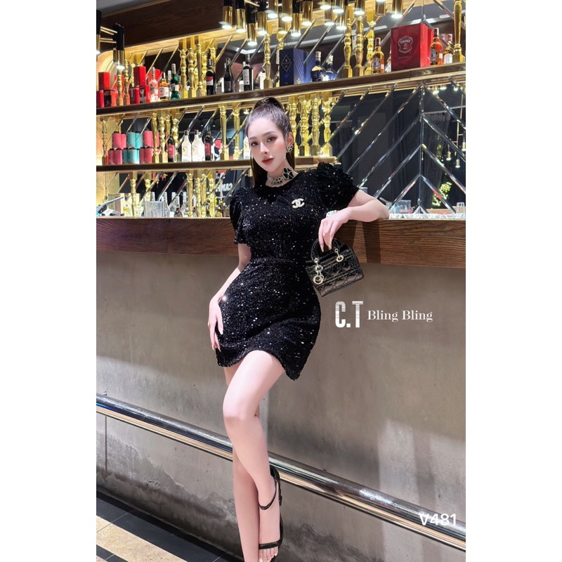 Váy bling đen hở lưng