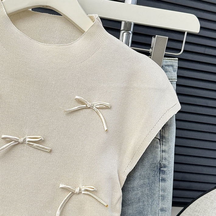 Áo len chất dệt kim, tay nhí đính ruy băng nơ mềm mịn, độ co giãn nhiều, freesize dưới 60kg - 55Kg.Linh