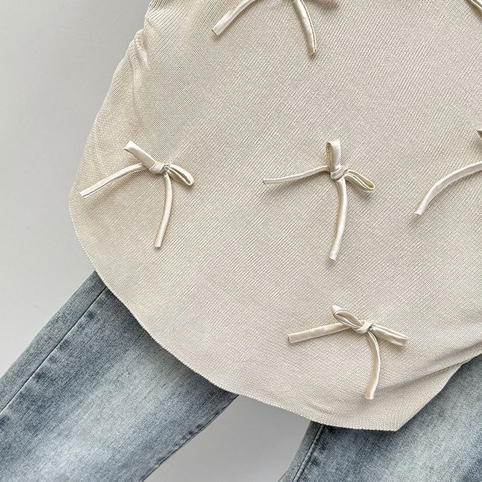 Áo len chất dệt kim, tay nhí đính ruy băng nơ mềm mịn, độ co giãn nhiều, freesize dưới 60kg - 55Kg.Linh