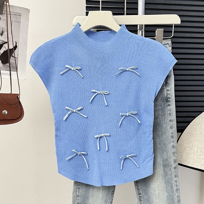 Áo len chất dệt kim, tay nhí đính ruy băng nơ mềm mịn, độ co giãn nhiều, freesize dưới 60kg - 55Kg.Linh