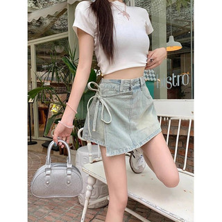 Chân váy jean dáng chữ a buộc dây nơ