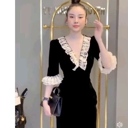 đầm đen tiệc thuylinh