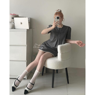 Set áo crotop đính nơ ngực tay bồng kèm chân váy chữ A phối viền trắng, set áo và váy