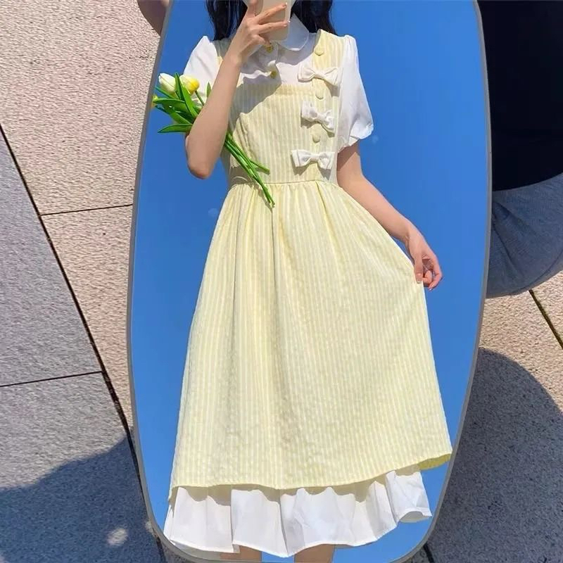 Váy Dáng Yếm 2 Lớp Đính Nơ Phối Liền Áo Sơmi Phong Cách Nữ Nhẹ Nhàng