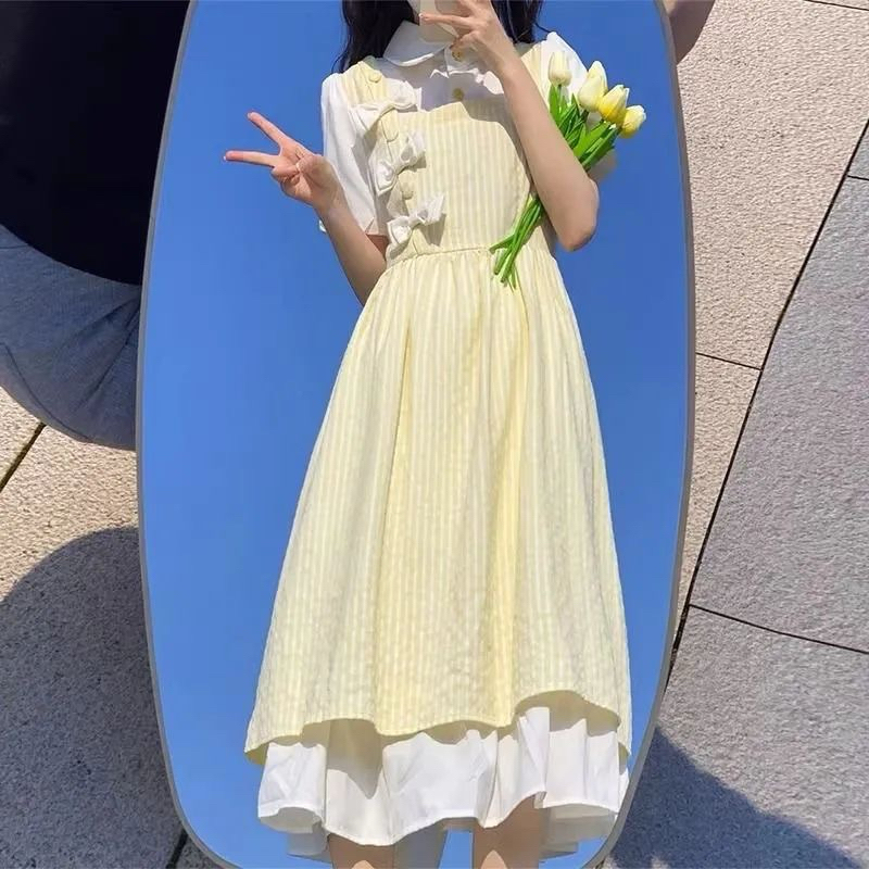 Váy Dáng Yếm 2 Lớp Đính Nơ Phối Liền Áo Sơmi Phong Cách Nữ Nhẹ Nhàng