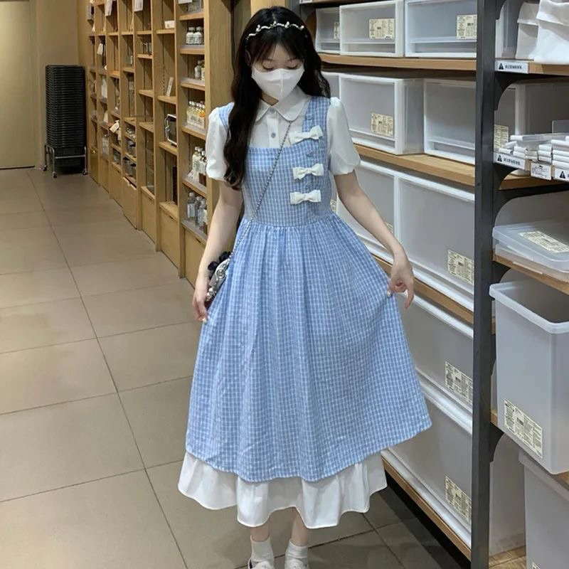 Váy Dáng Yếm 2 Lớp Đính Nơ Phối Liền Áo Sơmi Phong Cách Nữ Nhẹ Nhàng