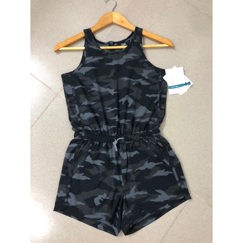 Áo liền quần thiếu nữ Athleta Girl màu đen họa tiết  rằn ri 14-17tuổi