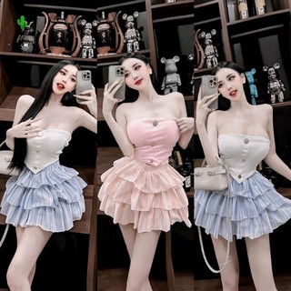 Sét áo nút vạt nhọn và chân váy xòe tầng