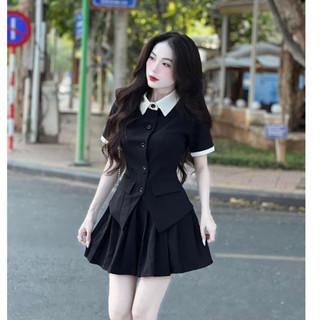 Set áo vest kèm chân váy xếp ly