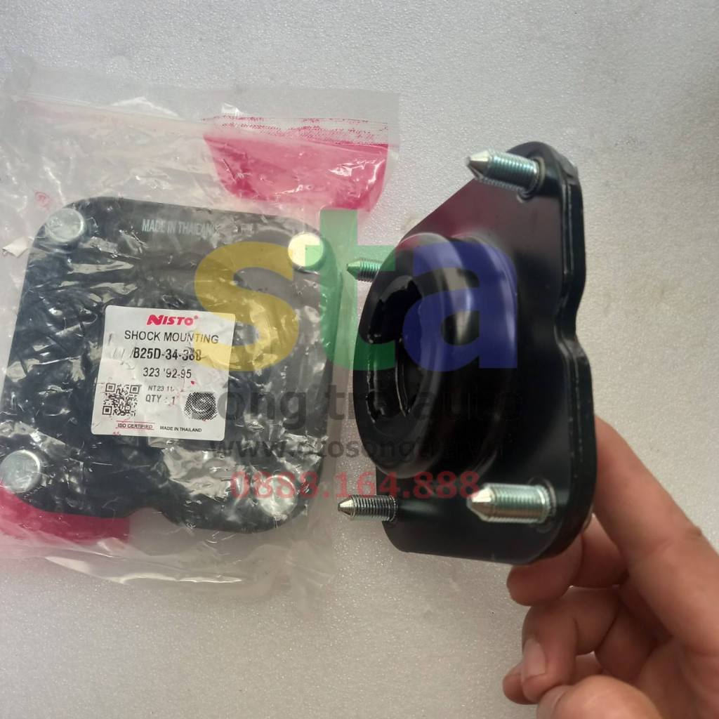 Bánh bèo phuộc trước Mazda Premacy. Bát bèo giảm xóc trước Mazda Premacy. Ảnh là  hàng Thái Lan