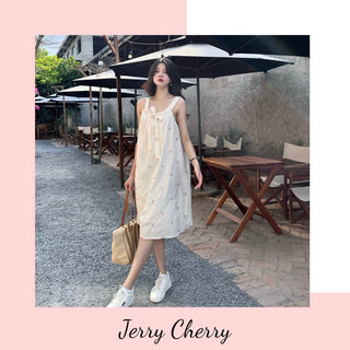 Đầm hai dây thêu hoa nhí cột nơ