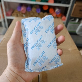  Gói hút ẩm máy ảnh đồ điện tử  1 gói . Hạt hút ẩm Silicagel. Gói chống ẩm loại tốt hút nhanh không độc hại 