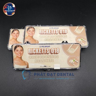 Mắc cài kim loại hệ ricketts