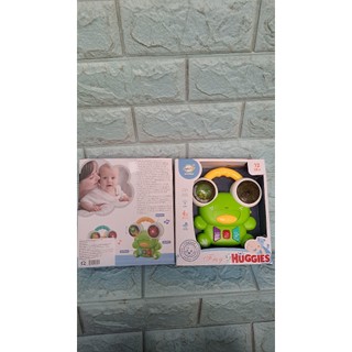 Đồ chơi nhạc cụ hình con ếch huggies