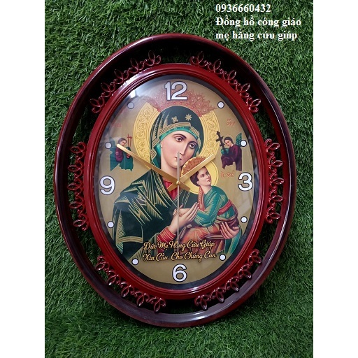 Đồng hồ treo tường oval có in hình size 45x35 đồng hồ trang trí quà tặng công giáo