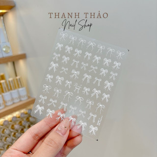 Sticker nơ trắng lụa tomoni