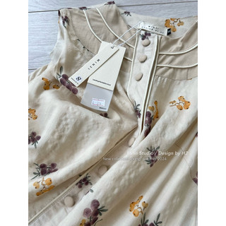 Váy xuông thô hoa phối cổ