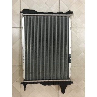 Két nước làm mát chevrolet spark 2009-2010
