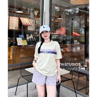 Set áo trằng kem in tím sọc ngực + quần short tím có túi lưng thun