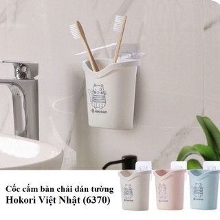 Cốc cắm bàn chải dán tường Hokori Việt Nhật . Cốc Cắm Bàn Chải Đánh Răng Dán Tường Hokori Việt Nhật có lỗ