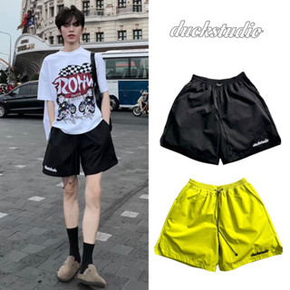 QUẦN SHORT DÙ THÊU DUCKSTUDIO FORM RỘNG TRÊN GỐI UNISEX NAM NỮ