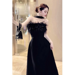 Đầm cup xoè đính lông vũ