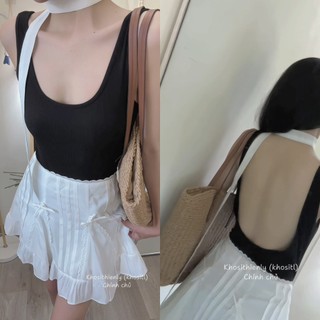 Set jumpsuti đen tag hoa + chocker cổ + chân váy trắng viền ren