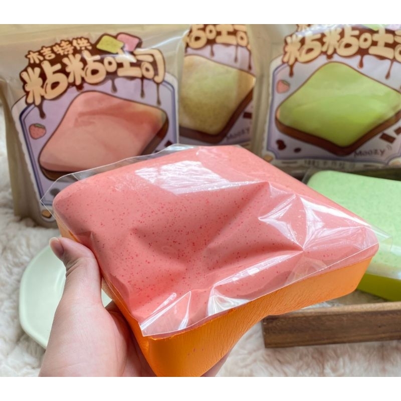 squishy toast mozzy chính hãng size jumbo chất bơ siêu chậm tăng kèm hộp mica