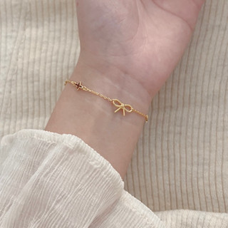 Vòng tay nữ họa tiết nơ và lá bốn cánh nhỏ nhẹ nhàng lắc tay bạc S925 mạ vàng 14k Gigi Jewelry LT002