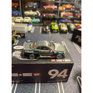 mô hình xe KHMG074 Nissan Skyline GT-R R34 CHASE Greddy Kaido Works chính hãng Kaido House - MiniGT #074 tỉ lệ 1:64