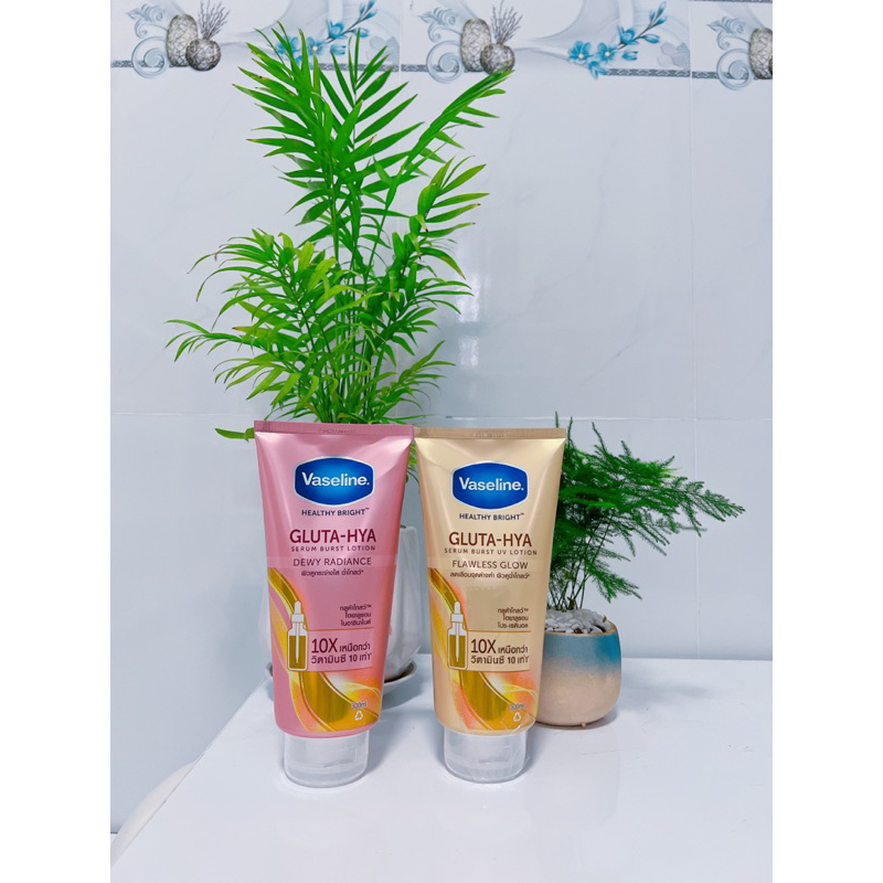 vaseline gluta hya 10x chai 300ml màu vàng và hồng
