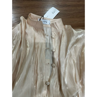 Áo thiết kế hàng new tag
