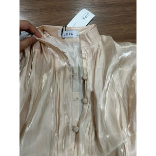 Áo thiết kế hàng new tag