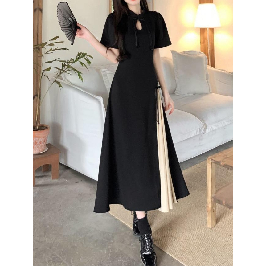 Đầm đen sườn xám Trung Hoa màu đen chân váy xòe phối trắng