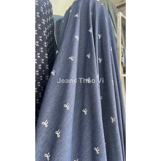 Vải jeans bò hoạ tiết nơ đậm 1m
