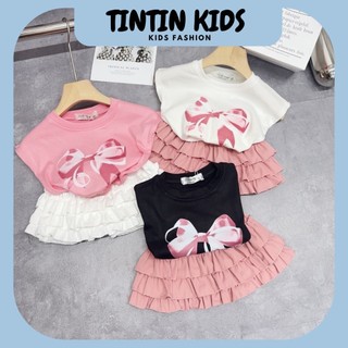 Sét váy cánh tiên in nơ kèm chân váy bồng bềnh cho bé gái 7-17kg