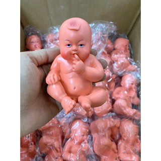 Tượng bé trai _tượng cầu con bằng đá .