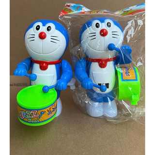Đồ chơi Doraemon đánh trống vặn cót bằng nhựa ,chú voi đánh trống