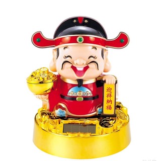 Thần tài lắc đầu Ông thần tài gật đầu chiêu tài lộc
