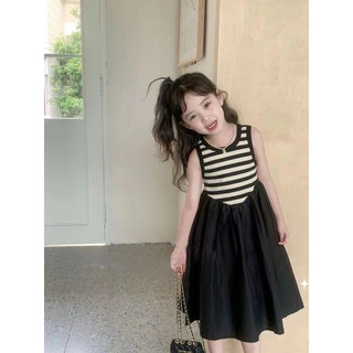 Váy kẻ đen Qc cho bé gái