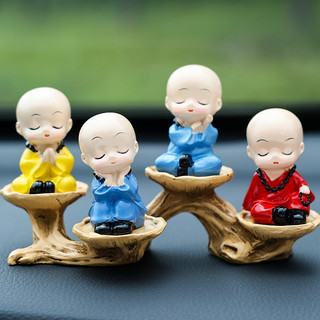 Bộ tượng 4 chú tiểu dễ thương ngồi trên gốc cây