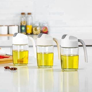 Hũ đựng nước mắm, xì dầu, dầu ăn 300ml bằng thủy tinh trong suốt chịu nhiệt, tự động mở nắp khi rót không cần dùng tay